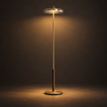 Kalem - Floor Lamp illuminated against a warm charcoal gallery background