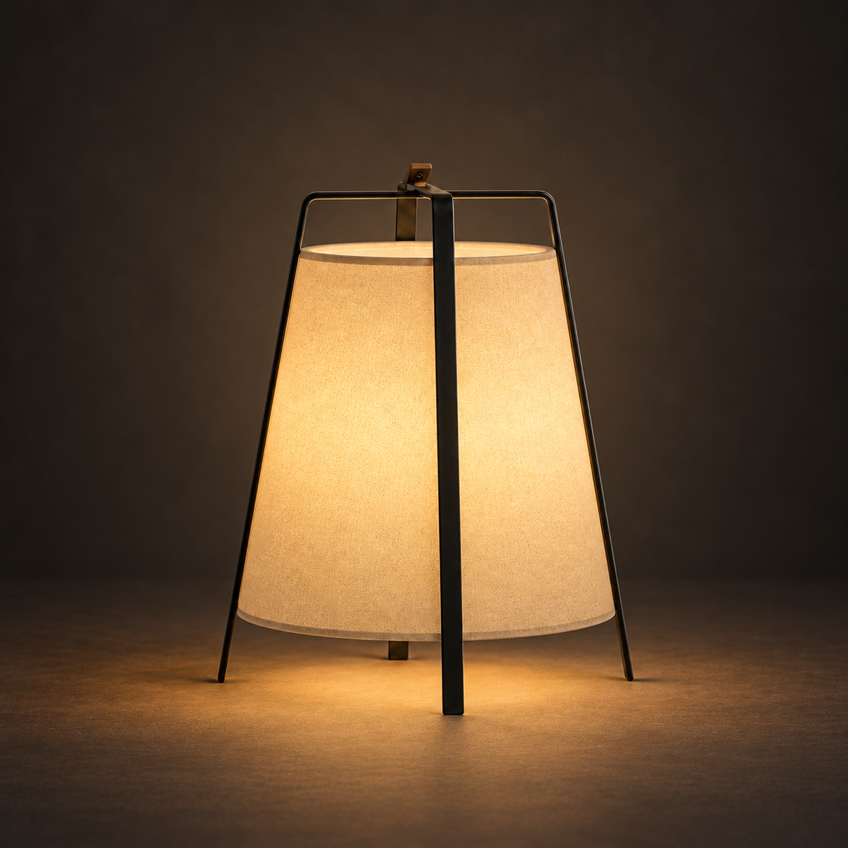 Mons - Wabi Sabi Floor Lamp illuminated against a warm charcoal gallery background
